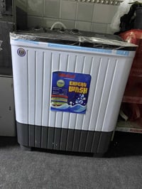 غسالة حجم وسط • شبه جديدة • كوفة حي ميسان