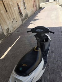 كامكو • ١٢٥ • موديل ١١