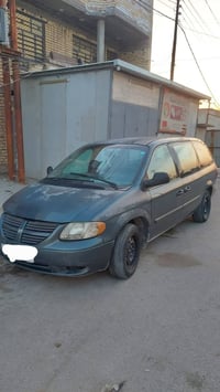 دوج كرفان 2006 رقم بغداد  باسمي  تحويل ثاني يوم شاصي طويل قطعه وحده تب...