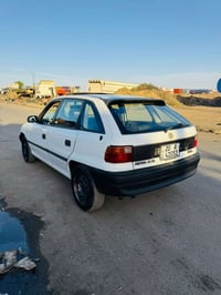 أسترا موديل 95 محرك كير شرط رقم جديد كربون بنزين شرطة تحويل السعر 40 ب...