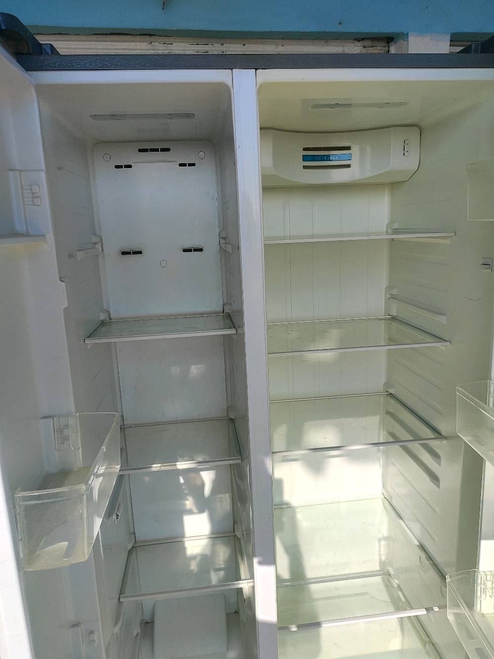 ثلاجه بابين شغال سعر ٢١٥ وبي مجال نينوى ناحية برطله طريق خزنه 