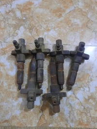 انجكترات هيتاشي • نوزلات ازوزه ١٠٥ • قطع غيار