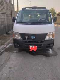 نيسان موديل ٢٠١٠رقم بغداد النكليزي كير محرك تبريد شغال صبغ شوية بل جنط...