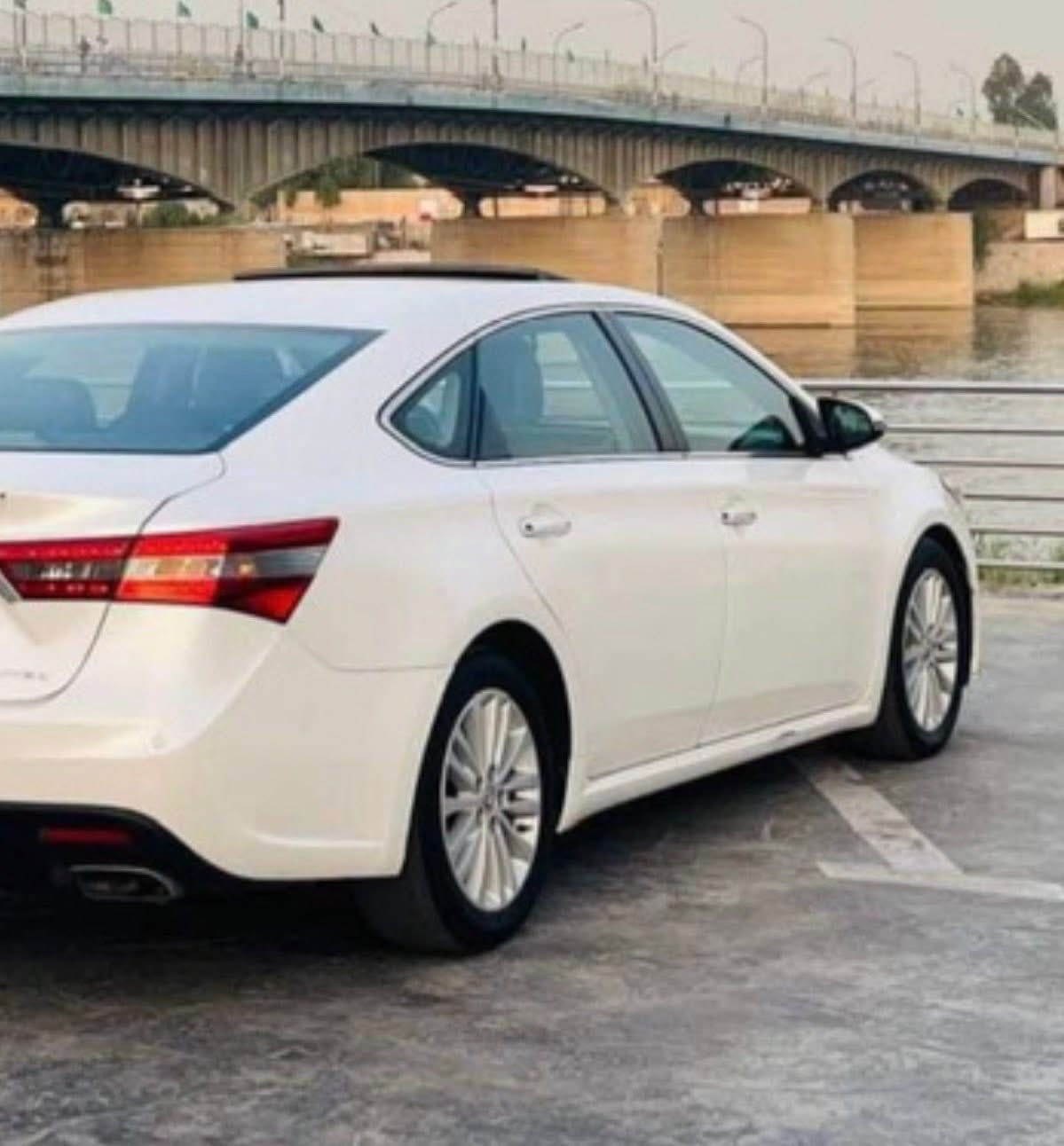 افلون  ابيض صدفي باب سكن فقط مرشوش اثر شخط والباقي مكفول رقم بغداد انكليزي بااسمي موديل 2013خليجي فول مواصفات لمتد تدفئه تبريد كشنات حساسات امامي خلفي   لايت  زينون سلايد روف برده خلفيه  ثلاثه انضمه قياده سياره جاهزه مناقصها اي شي. مكان كركوك للاتصال ***********///***********.  السعر١٨٩
