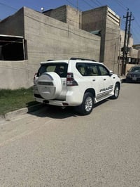 برادوا 2015 فئة VX ابيض بغداد ماشيه 88 الف فول مواصفات لايت عدسه وكشنً...