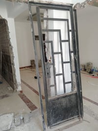 باب حديد صب • ٢١٠×٨٨سم • ٢٠٠كجم