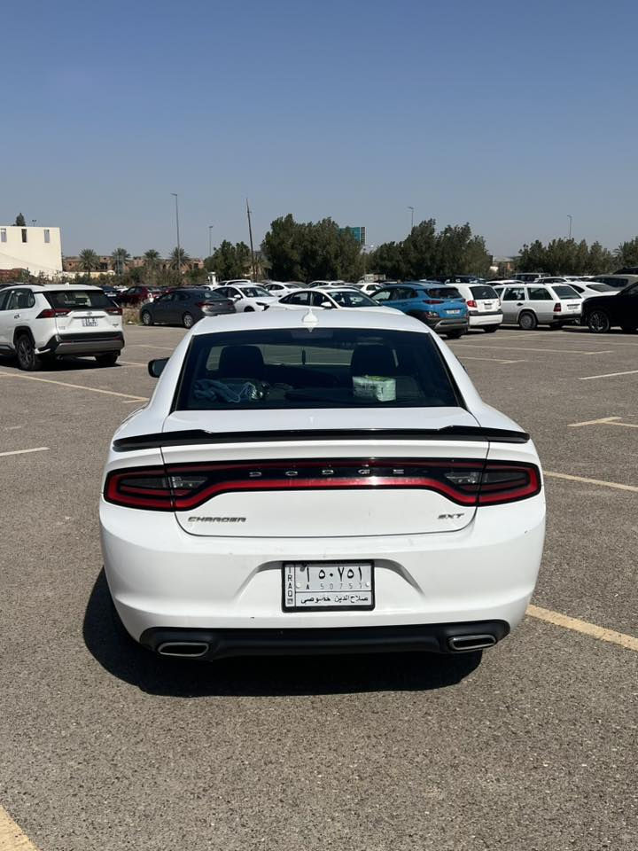 جارجر sxt 2016
📍اللون ابيض
📍المسافة 133 ميل
📍تو ويل
📍حجم المكينه 3,6L  6V
📍الرقم صلاح الدين مشروع وطني باسمي شخصياً
📍شاشة كبيرة + كامرة خلفية
📍كشنات جلد 
📍منظومة غاز 
📍كير طيارة 
📍تشغيل عن بعد 
📍ويل 18
📍السنوية تنتهي 2028
📍داخلة كلين صار بيه دحجه بالبنيد موضح بالصورة وبقى مثل ما هوه شويه 
تعدل

📍بغداد التاجي قرب جسر المثنى📍
هاتف *********** وبي واتساب 
السعر ١٨٠ ورقة وبيها مجال
