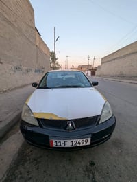 لانسر • ٢٠١٠ • مكينة وفتيس جديد