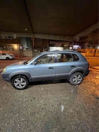 سيارة توسان للبيع موديل ٢٠٠٨ رقم بغداد باسمي فور ويل فتحة سقف تختم تاي...