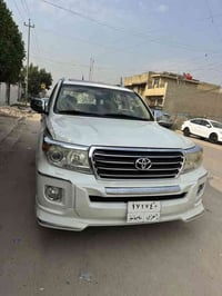 لاندكروز 2014  مكفوله عامه  ماشيه90 الف  رقم سليمانيه  مكينه v6 حساسات...