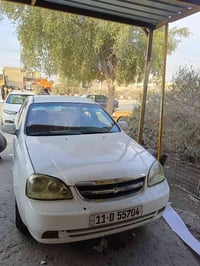 اوبترا موديل ٢٠١٢ خليجي بيها جاملغ الأيمن والايسر طخات بسيطه صدر أمامي...