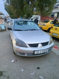 لانسر 2008 • اوتوماتيك • تلعفر