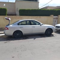 اوبتيما للبيع موديل ٨خليجي مكينه ٢٠٠٠سياره بيه داير الجاملغ الخلفي وال...