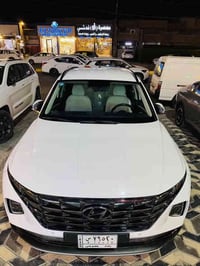 للبيع توسان مديل 2023 لون ابيض وارد خليجي   كشنات كهرباء مخمل  تحكم اس...