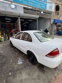 نيسان سني 2008رقمهة بغداد تحويل ثاني يوم السيارة نضيفة كير محرك مكفولا...