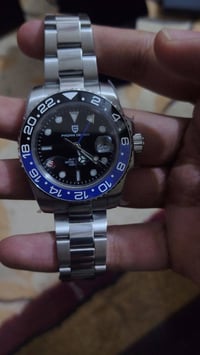 باجاني ديزاين باتمان ساعه جديد ما مستخدم سعر 120 كامله ملحقات شراي 077...