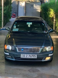 أوبتيما 2002 ..... وفود...🫠 لون ل مميز 🪬    رقم بغداد....   الدولي 11 ...