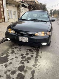 ١٩٩٥ • زيتوني مصبوغ • مكينة وكير شرط