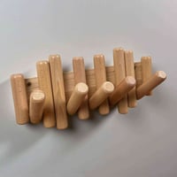 علاقة ملابس خشبية • أربيل