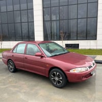 پڕۆتۆن • ٢٠٠٤ • گێر تۆماتیک