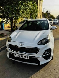 كيا سبورتج  موديل 2021 خليجي رقم بغداد  لون ابيض مكينه 2000 دوش بصمه ت...