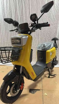 دراجه شحن   R 11    لون ليموني  ١- جهاز انذار وتشغيل عن بعد  ٢- اطارات...