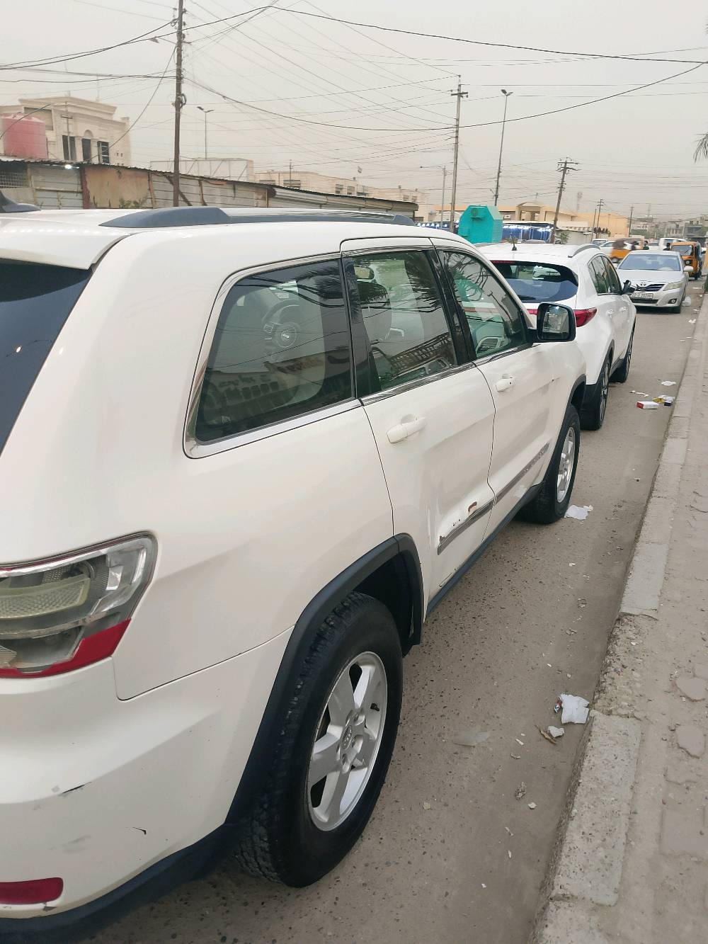 جيب لاريدو 2011 واريد بدون حادث واماكن بيه طخات داخل العراق  السعر 12500 دولار