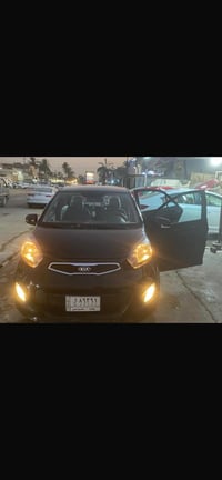 كيا بيكانتو 2014 خليجي  رقم بغداد اللون اسود بدون صبغ محرك 1400 المرغو...