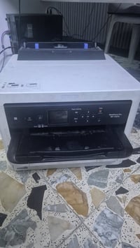 طابعة ابسون C5210 شغاله  تحتاج تنظيف فقط اربع الوان  موصفات عاليه جدا ...