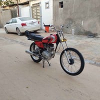 دراجة نارية • اوراق اصلية • نجف