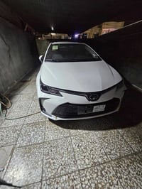 كورلا هايبرد موديل 24 ماشيه 5 الف على وضع الشركه باركود سعرهه 147 وبيه...