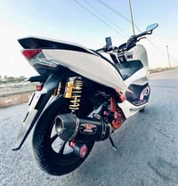1 جيل الثالث HONDA PCX  الدراجه لاتبخيه ولا نقص ال PCX مزوده  YOSHIMUR...
