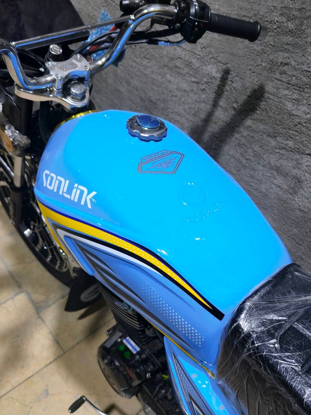 دراجه سونيك رقم بغداد انجليزي مكينه سي بي اف حجم 200 سي سي موديل 2025 العنوان بغداد الجديدة 