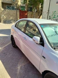اكسنت 2010 ماشية 200 الف رقم بغداد مكانه بغداد  السعر ٩٦ وبيه مجال  07...