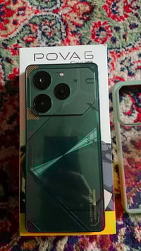 تكنو بوفا 6 برو 5g ذاكرة 256 والرام 24 بطاريه 6000 وشاحنه 70W والكامره...