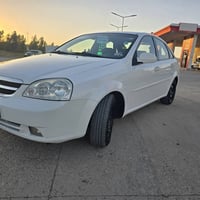 ئۆپترا ئۆتۆماتیک 2010 نمونە لە جوانی  یە ک پارجە بۆیاخ جاملخ دواوە سە ...