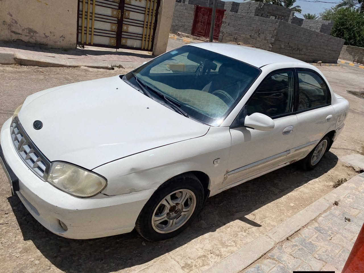 السلام عليكم اخوان كيا سبكترة موديل 2000  رقم بغداد انكليزي تحويل مباشر  كير عادي  مكينة كير  خير  من الله تبريد ثلج السيارة جاهزة العنوان بغداد مقابل المرور الحسينية ***********  السعر  35 وبيهة مجال قليل
