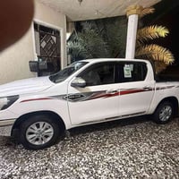 هايلوكس ناصي   رقم بغداد الجديد  موديل 2024  كفاله عامه شرط السونار حت...