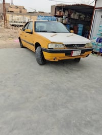 بيجو 405 • موديل ٢٠١٠ • رقم بغداد