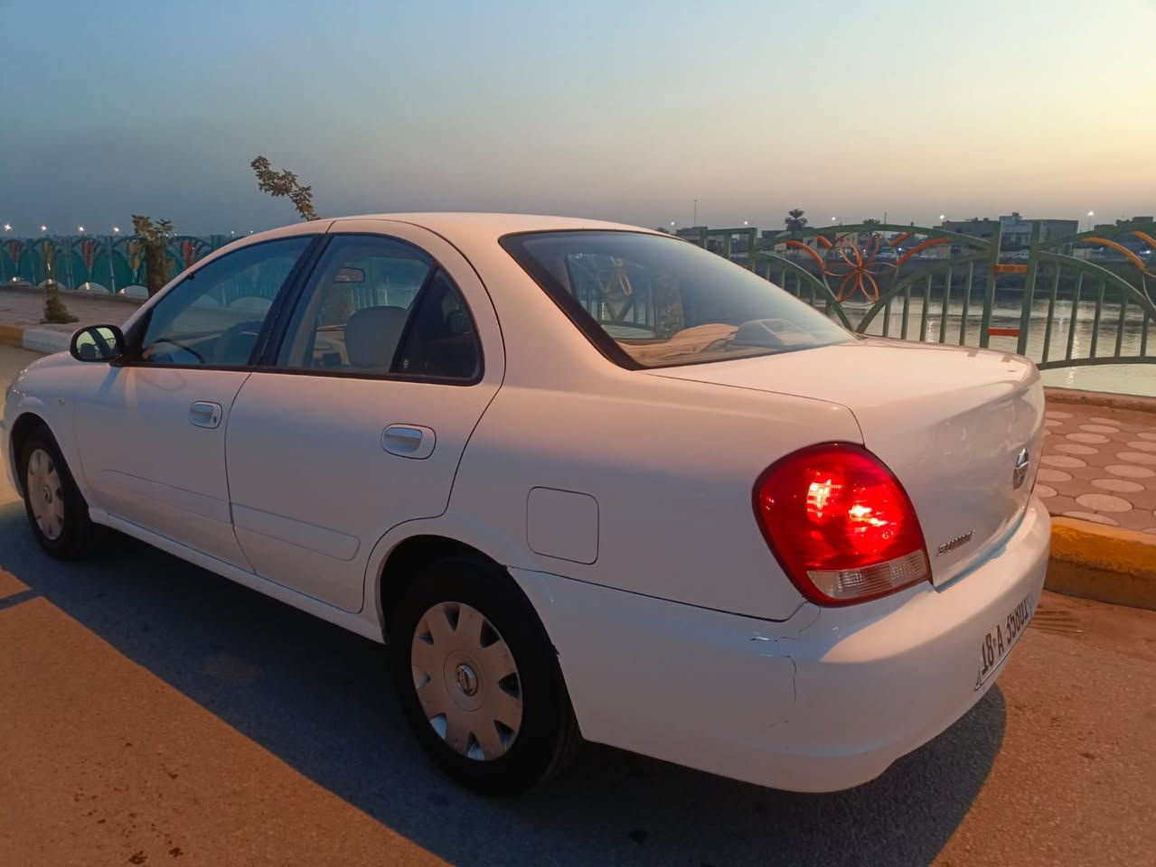 نيسان سني موديل ٢٠١٠ ياباني اصل ...فول اوتوماتيك مكفوله من الصبغ ماعدا شويه صبغ باب السائق فقط...كفاله محرك كير حداديه تخم تاير باتري كهربائيه كولها شغاله ..تبريد ثلج ...رقم بابل أنكليزي جديد سنويه ٢٩مانقصها اي شي .. علما  غير متواجد على الفيس....مكان السياره كربلاء.  رقم الهاتف /*********** اتصال+ واتساب
