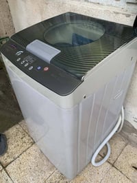 غسالة • زنجيلي