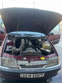 اوبل اوميكا ستيشن حجم 2000  لون ماروني رقم بغداد الإنكليزي بسمي تحويل ...