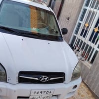 توسان ٢٠٠٩ • محرك ٢٠٠٠ • فتحة وكاميرا