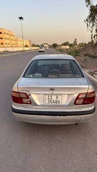 نيسان سني 2001 مكينة 1600 هزة سنوية جاهزة السعر 65 بغداد حي الجهاد  07...