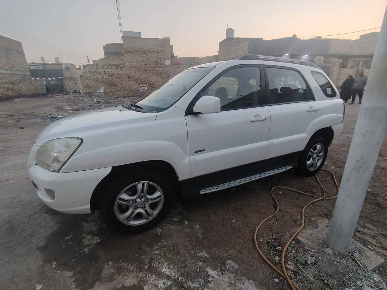 كيه سبورتج 2007رقم بصرة سنويه نافذة مكفولة ما عده صبغ في الباب الخلفي  (***********)
