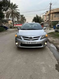 سيارة كورلا للبيع موديل 2013 رقم بغداد انكليزي اللون سلفر وارد امريكي ...