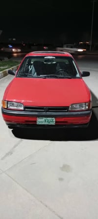 مازدا ٣٢٣ موديل ١٩٩٢ دژه فيته رمه كينه ١٦و به خ ئارم پلاستيك هه ولئر ب...