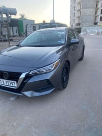 للبيع نيسان سنترا موديل 2023 بأسمي حادثها قطعة وحدة باب خلف السائق  سي...