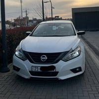 نیسان ئالتیما 2016 سپی بەفری   كامێرەی پێش و دواوە  140 هەزار ڕۆشتووە ...