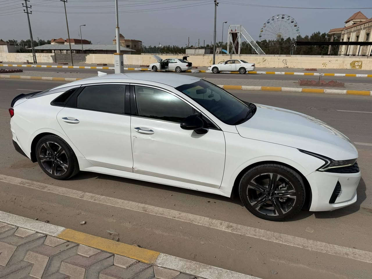 K5
موديل 2023 رقم بغداد 
سياره كفاله فقط دحجه بالباب ماشيه ١١٠ 
1_ بصمه تشغيل وتشغيل عن بعد
2_ حساس امامي خلفي 
2_ حساس ضغط اطارات
3_ كامره وشاشه اعطال وشاشه 
Apple car play + Android Auto 
4_ خمس وضعيات قياده 
(Comfort + Sport + custome + smart + ECO )
5_ مثبت سعره 
6_ تبريد لمس بيانو منفصل مناخين
7_ سياره مغلفه حمايه بنيد و دعاميه و لايت 
سعر 212 وبيه مجال 
***********
***********
سياره على وضع الشركه وجاهز
